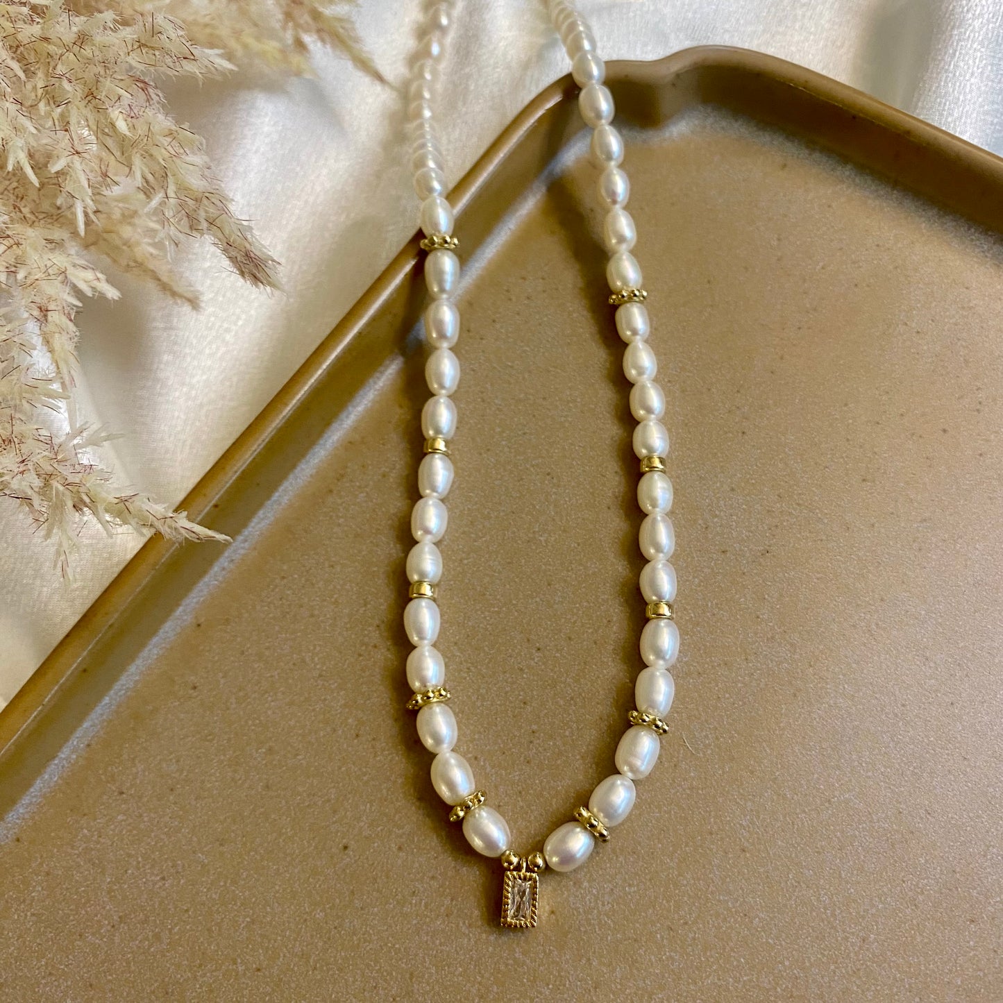 Pearl necklace golden elegance