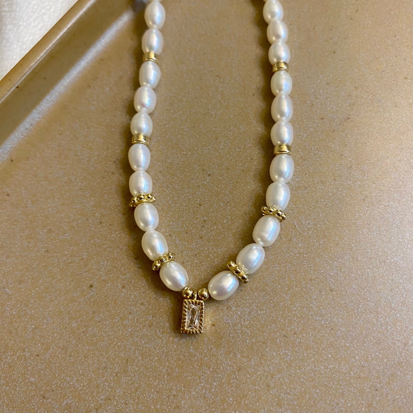 Pearl necklace golden elegance