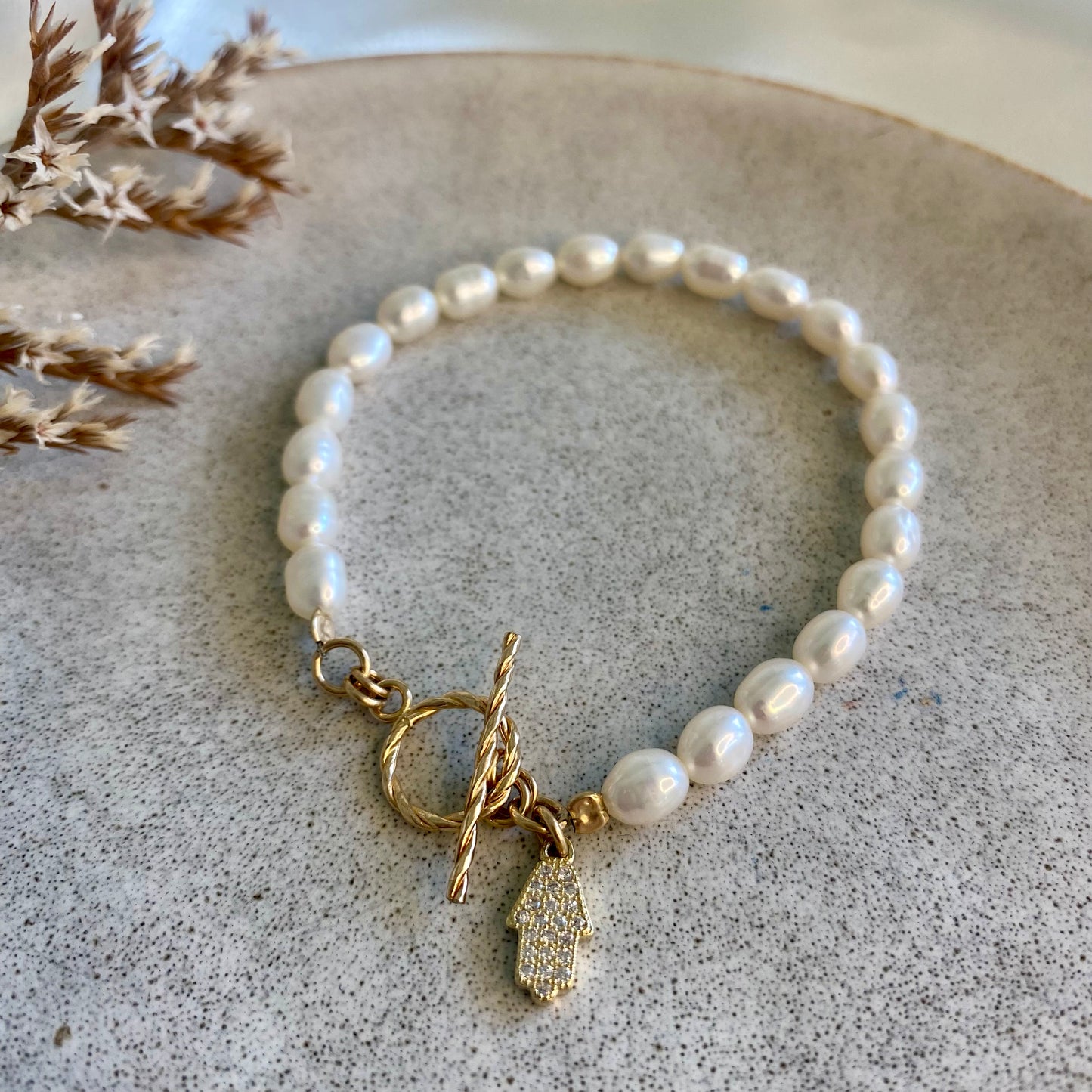 Pearls bracelet w Hamsa pendant